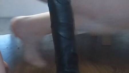 Playing with big dildo