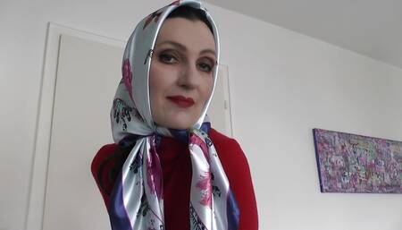Lady Victoria Valente Showed Elegant Satin Headscarves with a Red Cashmere Turtleneck Sweater