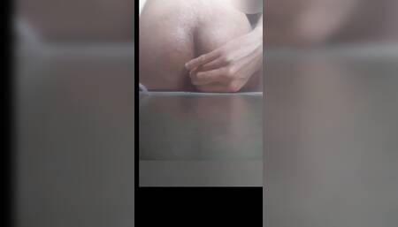 Masturbating her ass