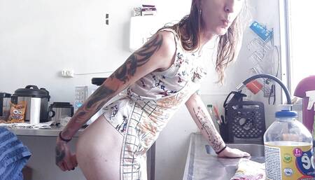 Trans housewife in the kitchen