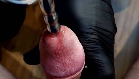CBT sounding cock close up