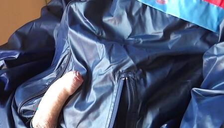 Cumshot on Adidas shiny nylon rainwear.. I like it shiny-- who else?!