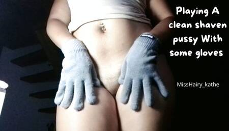 Touching a shaved pussy with gloves