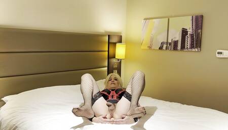 hotel sissy Jeri Lee  fucking and riding a big dildo in PVC
