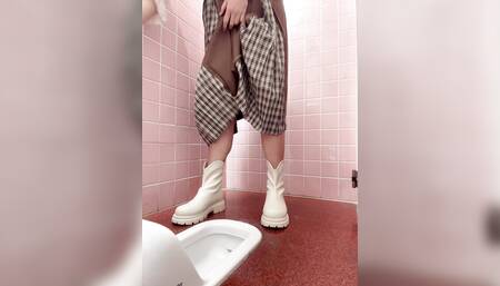 Mitsuha, a pseudo-mother wearing a pink chastity lock, pees in the women's toilet