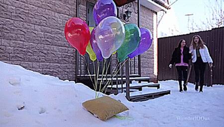Winter popping helium balloons