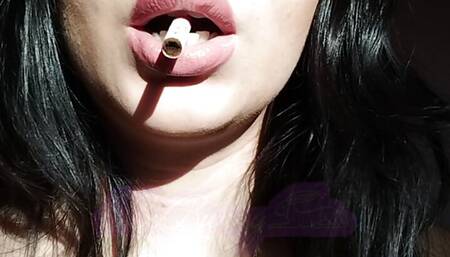 Big natural luscious lips close up smoking cigarette
