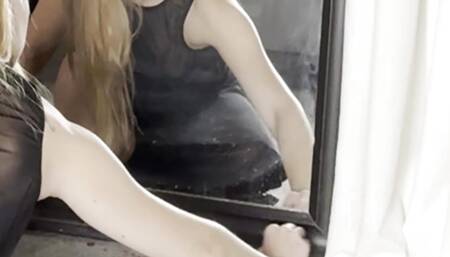 girl cleaning in a transparent dress and panties