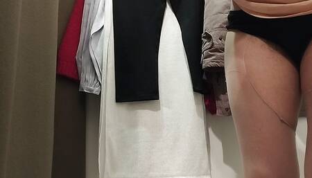 Sexy brunette tries on clothes in fitting room. I'm looking at a hairy, hairy pussy, big tits, big ass.