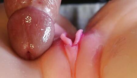 A thick cock gently and slowly penetrates inside with sweet moans