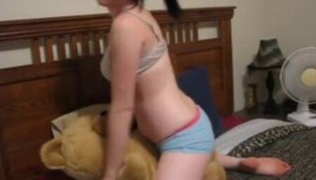 Teen humps her favourite stuffed toy