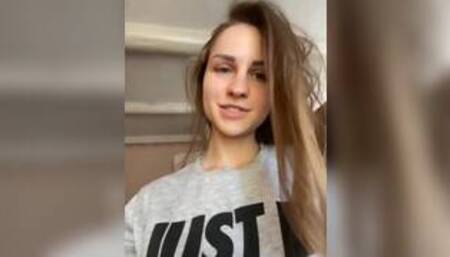 Hot teen fingers her ass on a live show